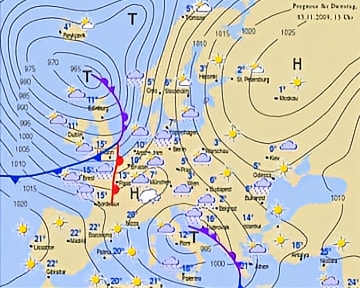 Carte météorologique pour le 3 novembre 2009, montrant des fronts chauds et froids avec des zones de précipitations.